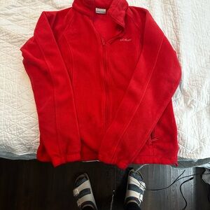 Women’s red Columbia jacket. Great for a cold day and layering.